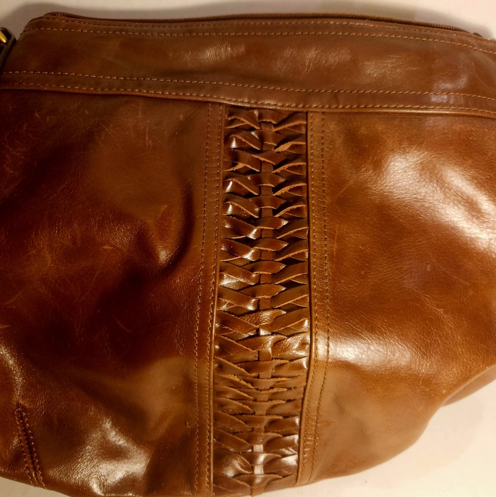 Tignanello brown leather purse with polyester lining has 6 pockets